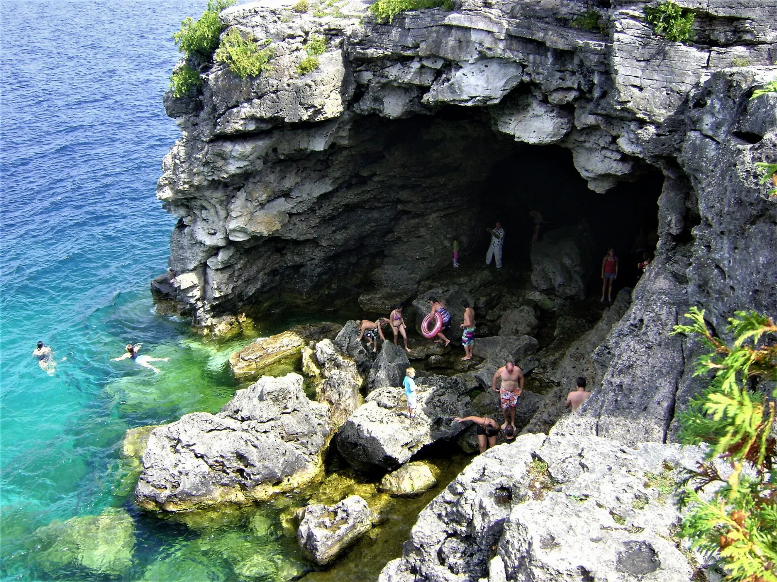 Blue water inside the Grotto sea cave in Bruce Peninsula National Park, Tobermory, Ontario
