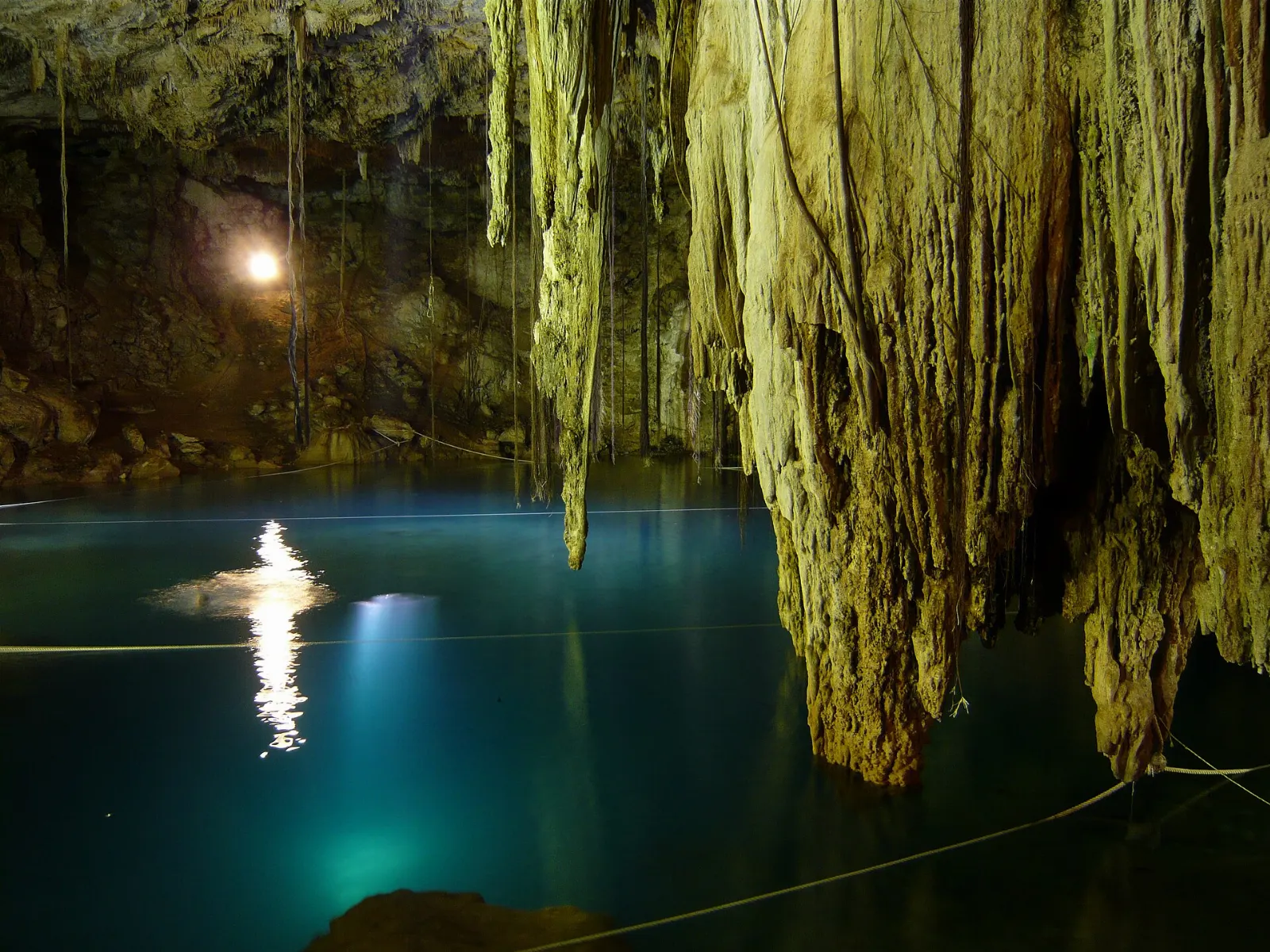 Clear water inside Cenote Noolha near Valladolid, Yucatán