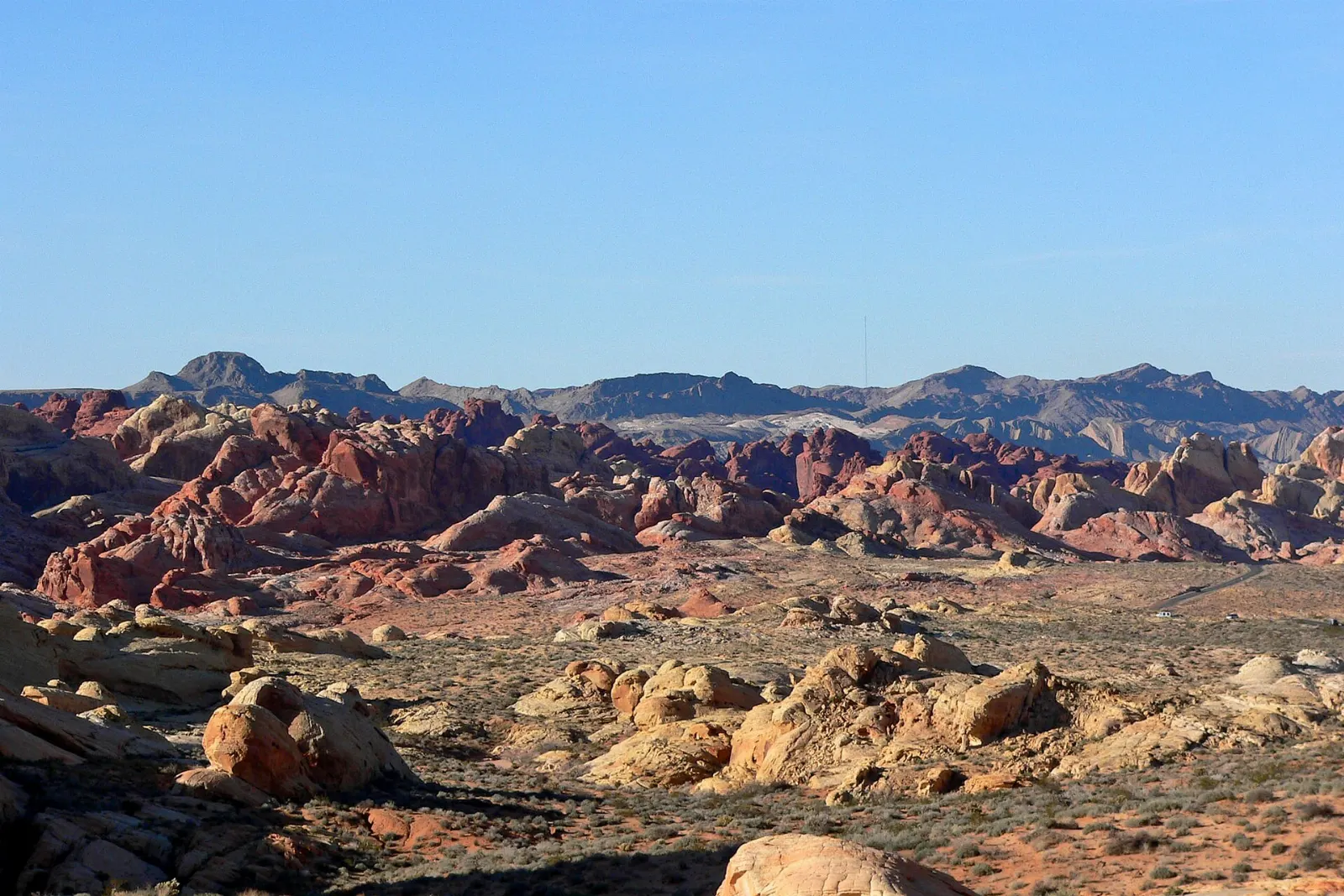 A panoramic view of multicolored sandstone ridges under a blue sky, Valley of Fire State Park, Nevada