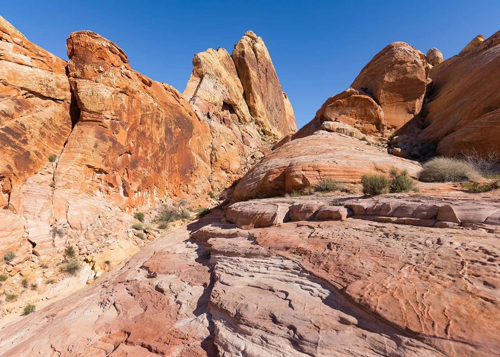 Pale sandstone domes and a narrow slot canyon along the White Domes trail, Valley of Fire State Park, Nevada