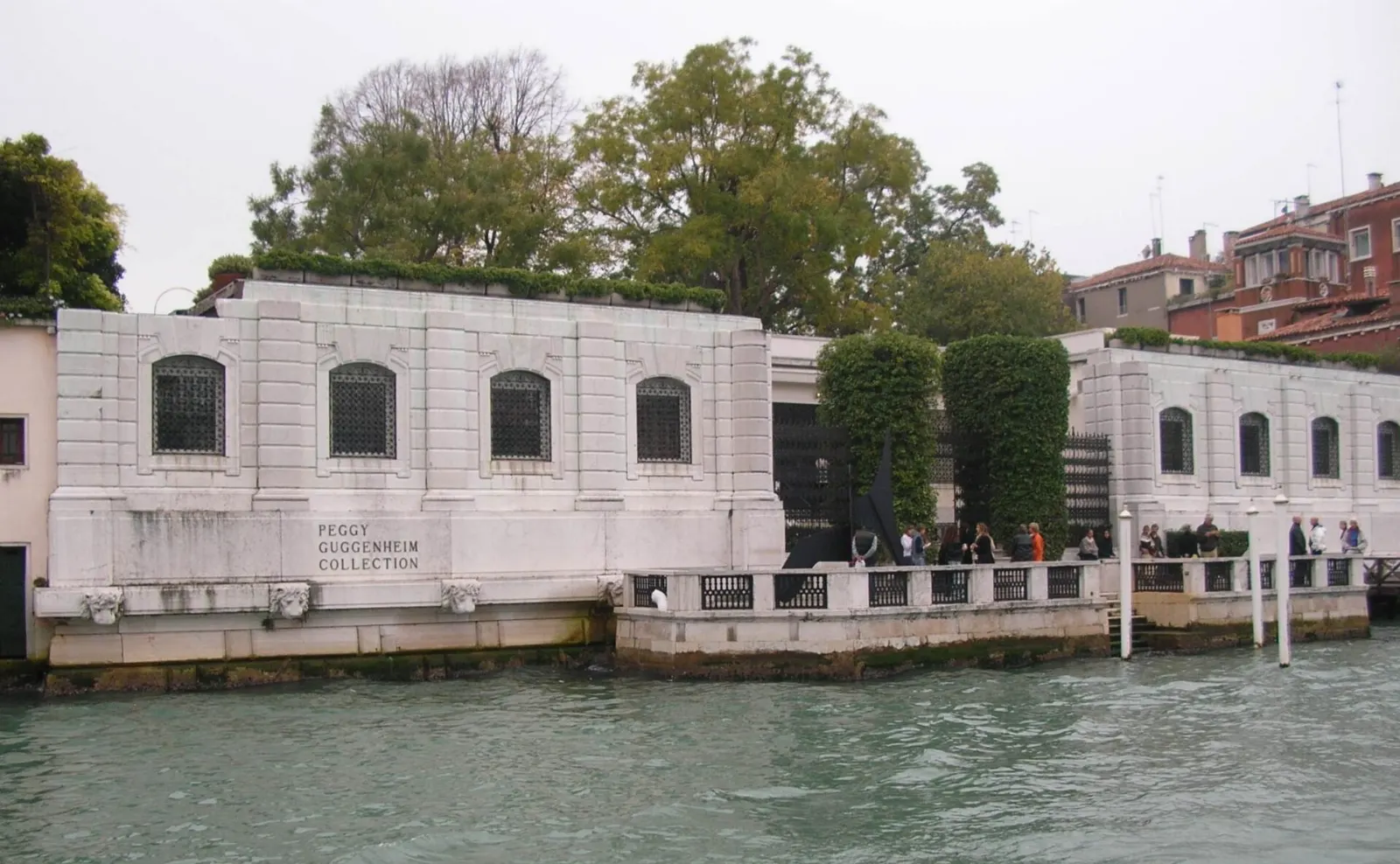 The low white Palazzo Venier dei Leoni on the Grand Canal, home to the Peggy Guggenheim Collection, Venice, Italy