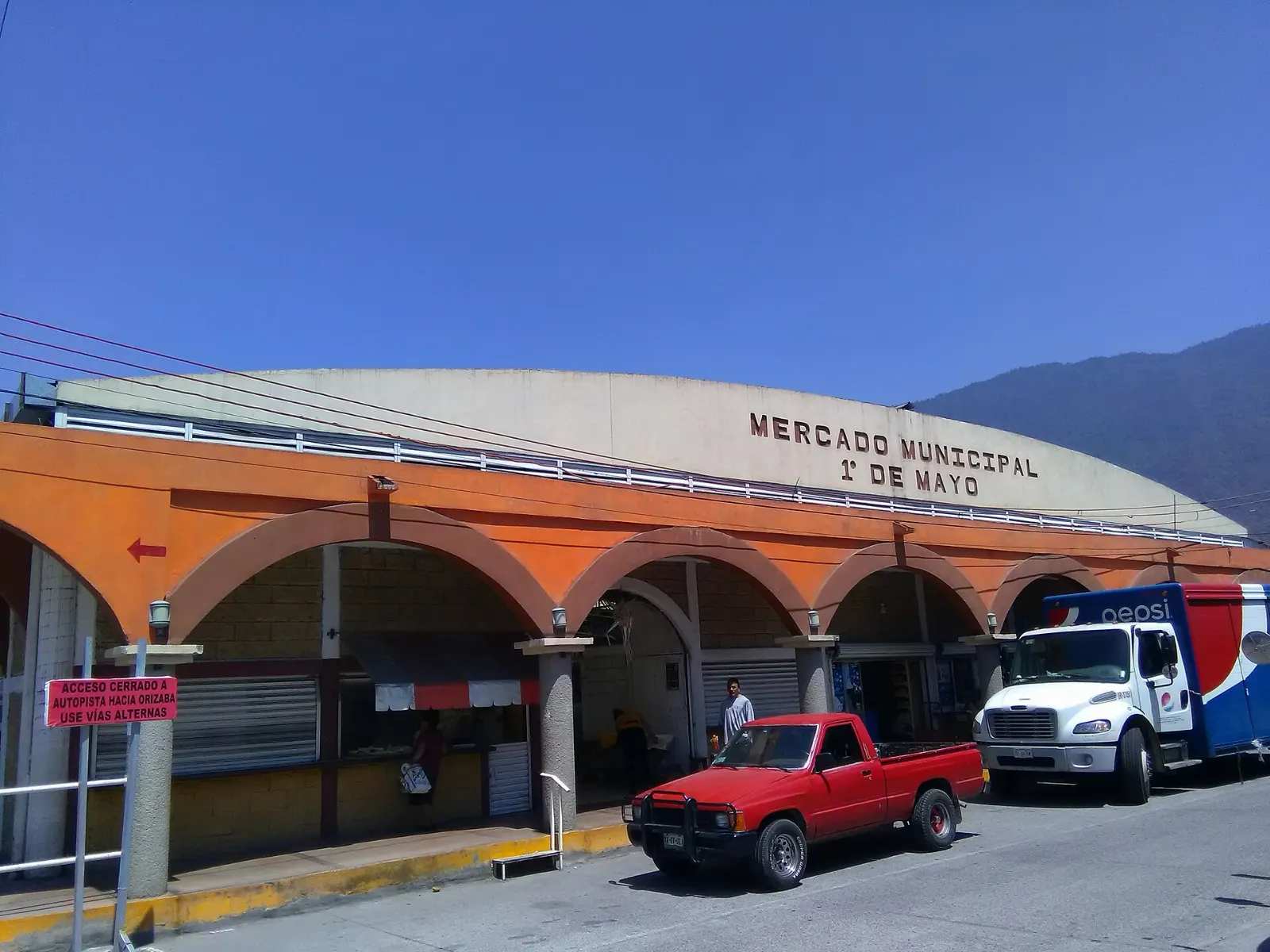 Fresh produce and seafood stalls at Mercado Hidalgo in Veracruz