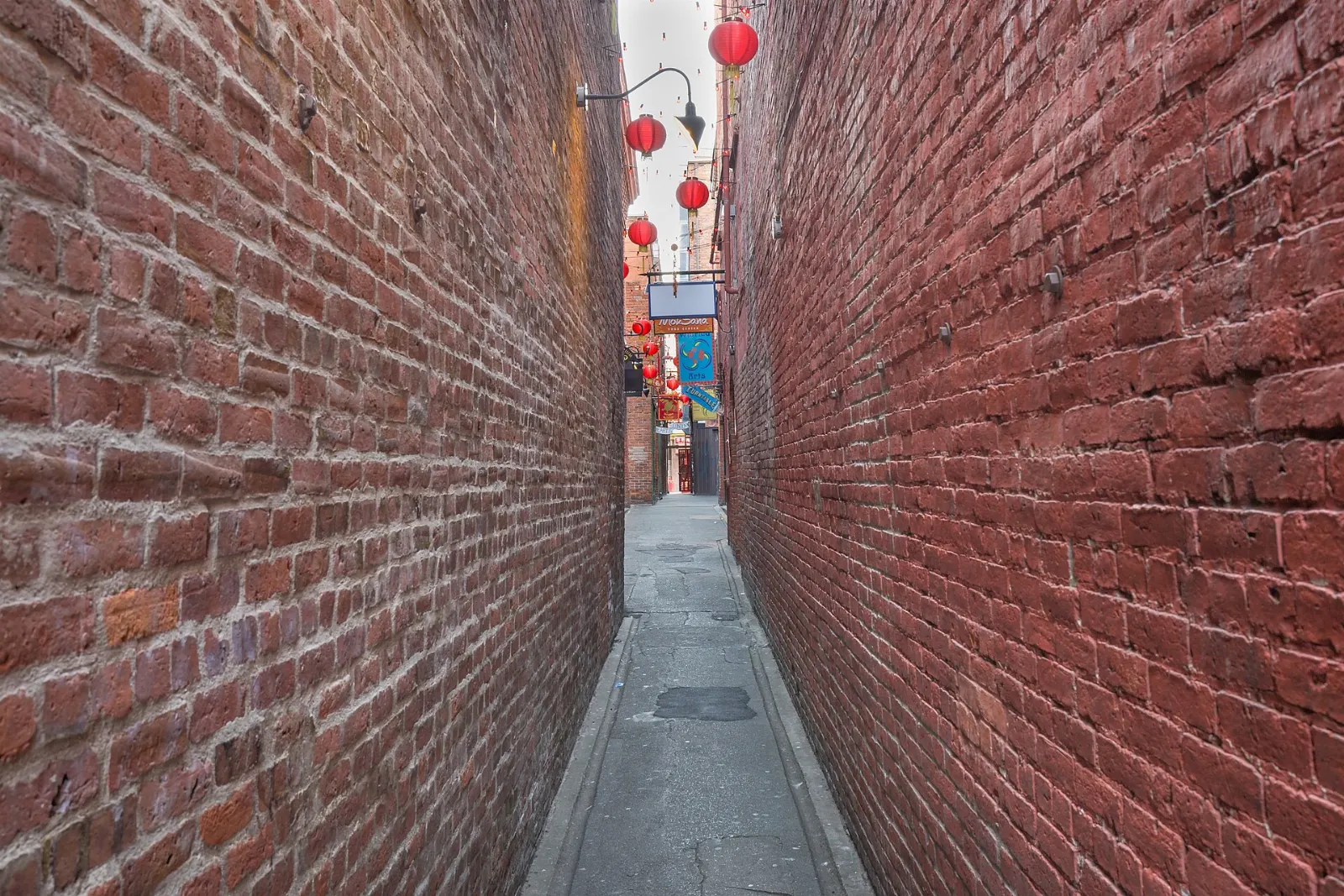 The narrow Fan Tan Alley in Victoria Chinatown, British Columbia