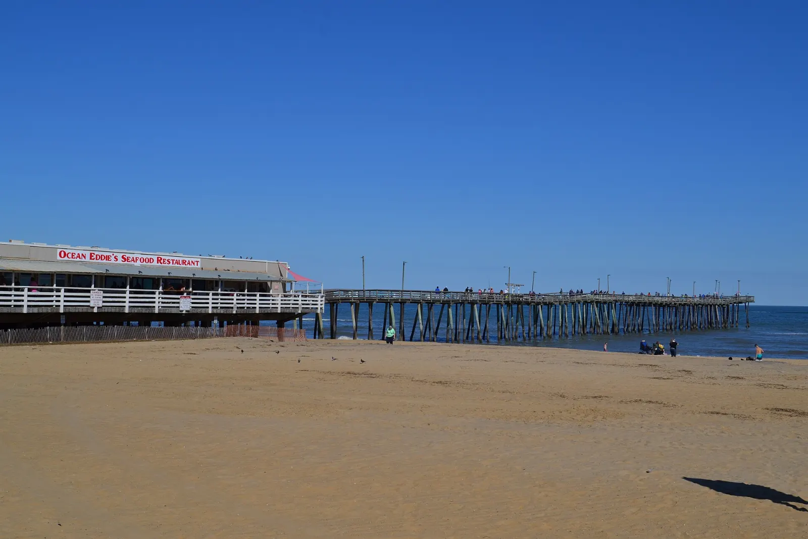 Wooden fishing pier stretching into the Atlantic from the Virginia Beach oceanfront