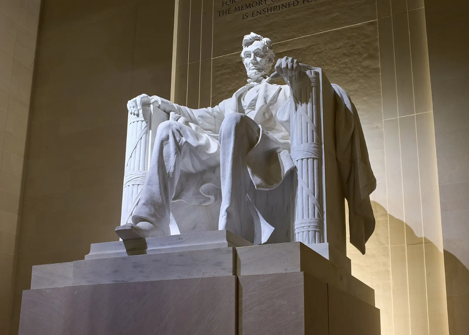 The seated marble statue of Abraham Lincoln inside the Lincoln Memorial, Washington, D.C., District of Columbia