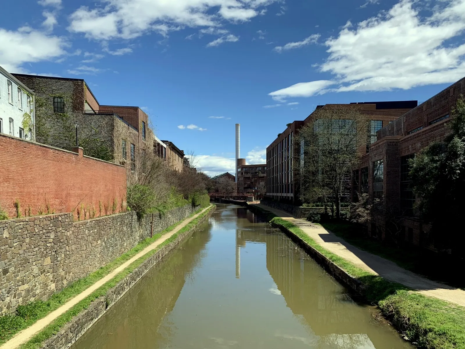Historic brick buildings lining the Chesapeake and Ohio Canal in Georgetown, Washington, D.C., District of Columbia
