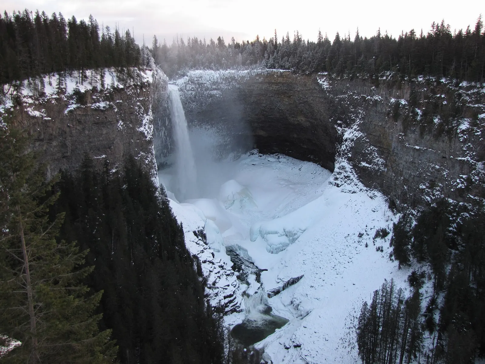 The ice cone at the base of Helmcken Falls in winter, Wells Gray Provincial Park, British Columbia