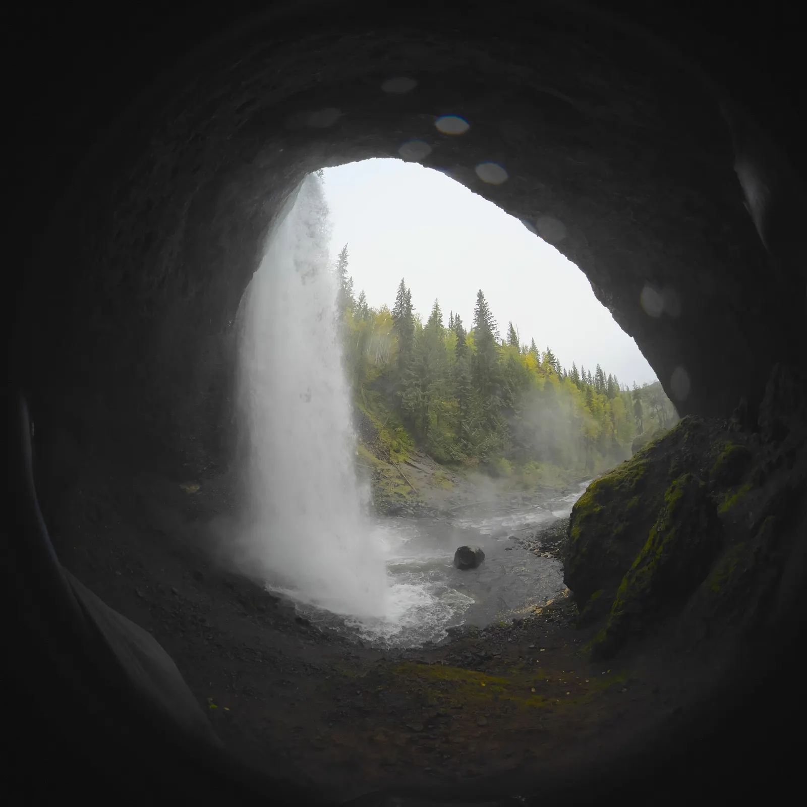 Moul Falls on Grouse Creek with the cave behind the water, Wells Gray Provincial Park, British Columbia