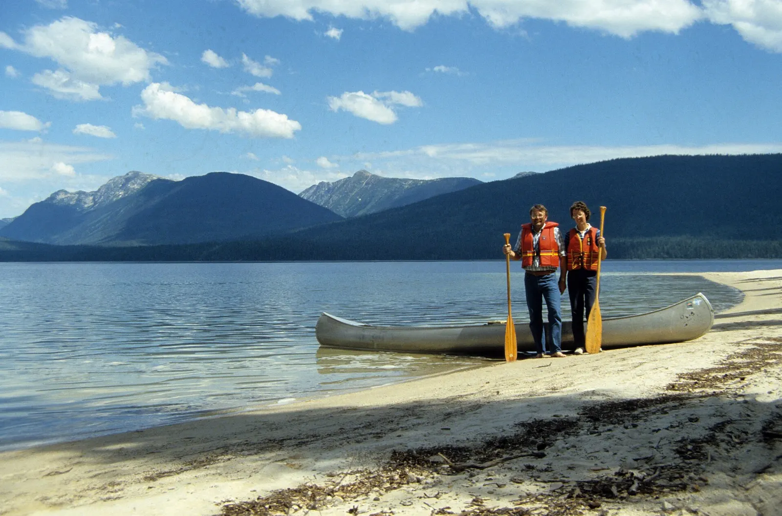 Canoe on the calm water of Murtle Lake, Wells Gray Provincial Park, British Columbia