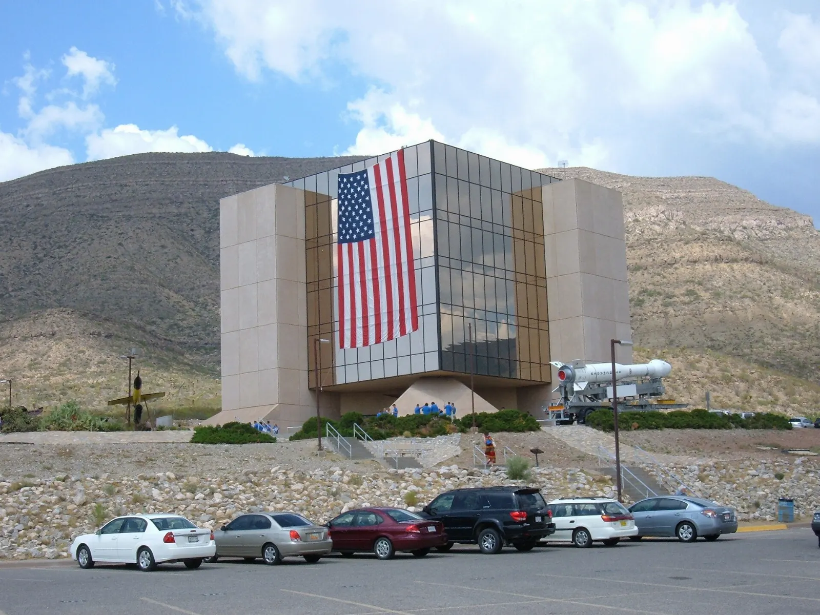 Gold glass tower of the New Mexico Museum of Space History on a hillside, White Sands National Park, New Mexico