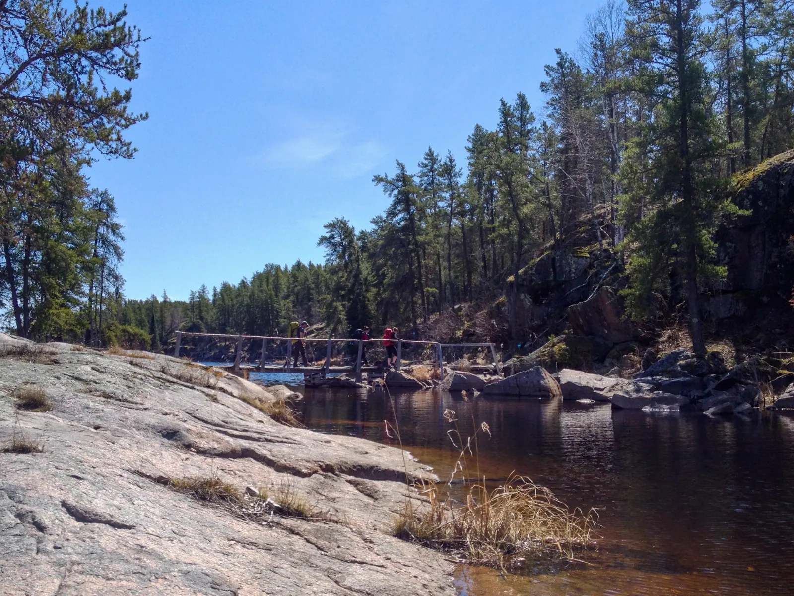 A hiker on the Mantario Trail in Whiteshell Provincial Park, Manitoba