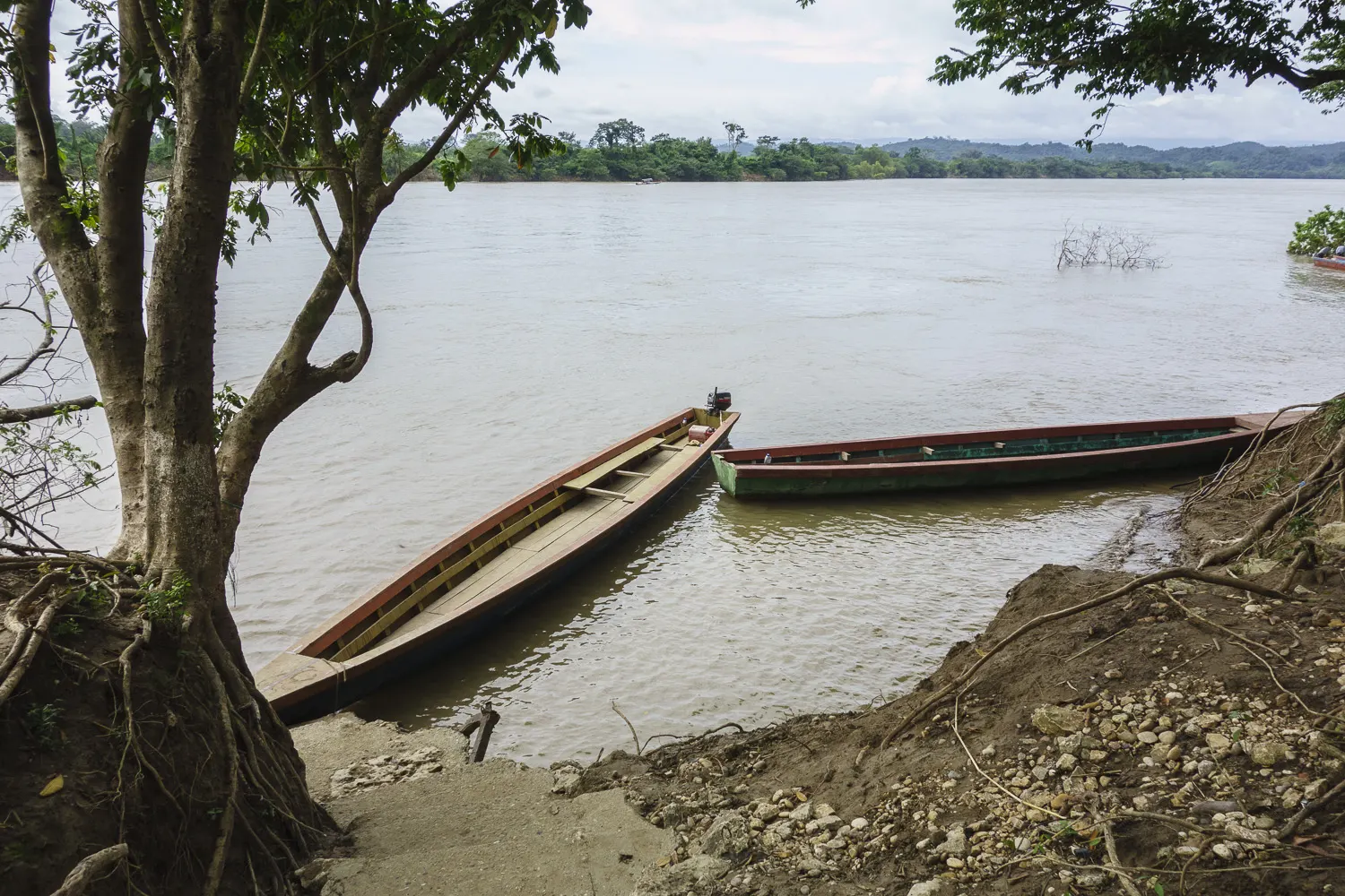 Narrow river boats waiting at the landing in Frontera Corozal, Yaxchilán, Chiapas