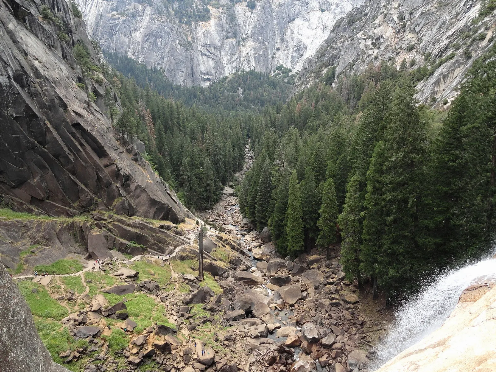 Vernal Fall plunging over a granite ledge beside the Mist Trail, Yosemite National Park, California