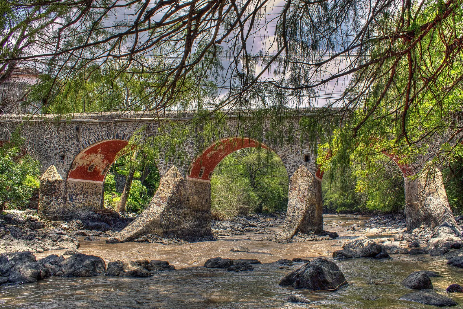 Stone arches of the Puente de Batanes in Salvatierra, Yuriria, Guanajuato