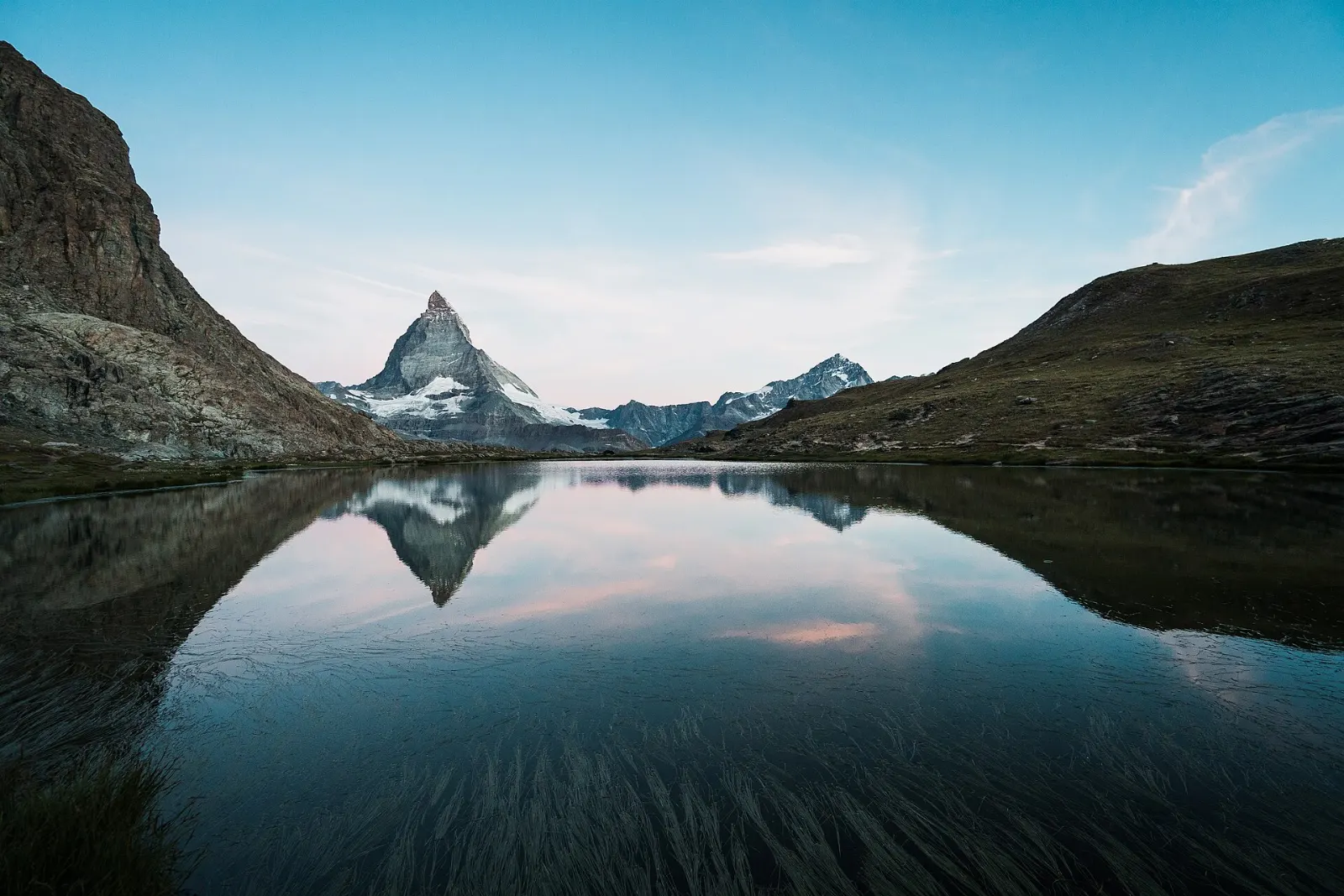 The Matterhorn reflected in the still water of Riffelsee, Zermatt, Switzerland