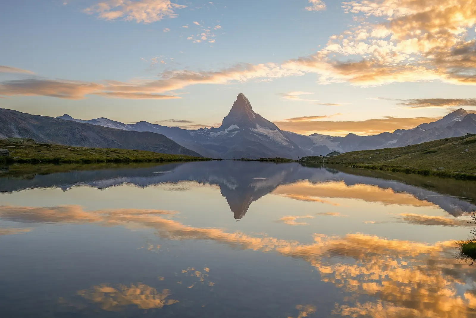 Small alpine lake Stellisee with the Matterhorn rising beyond, Zermatt, Switzerland
