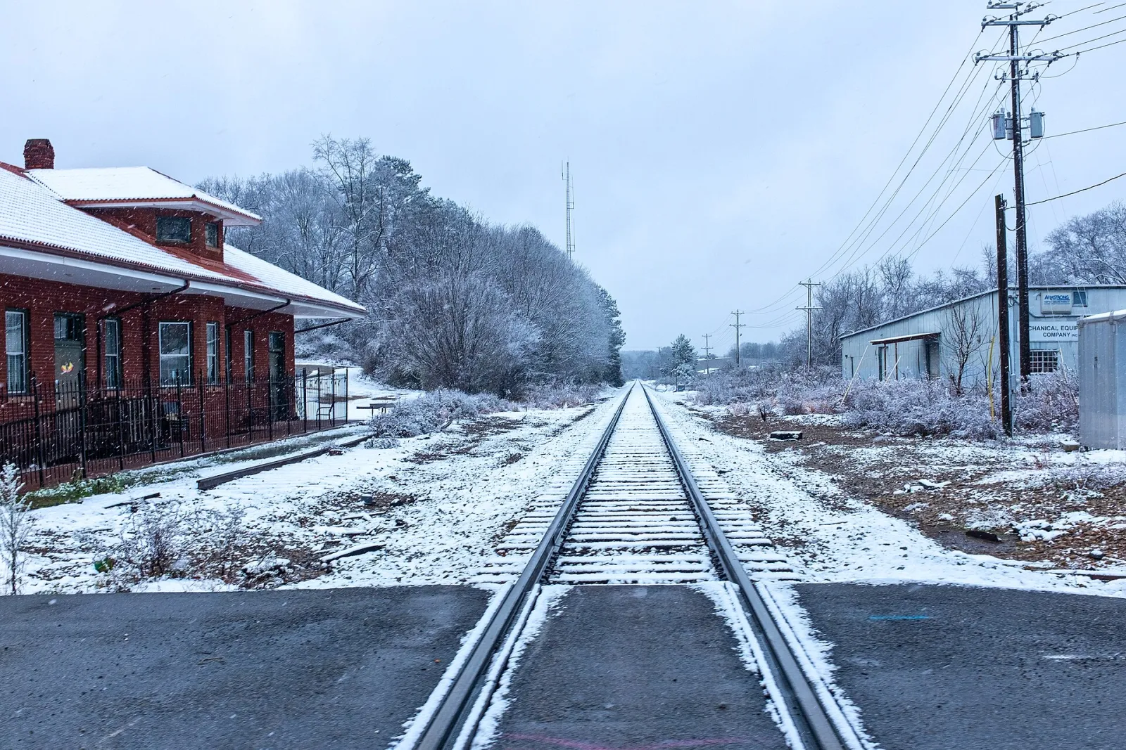 CSX Track and Historic Lawrenceville GA Depot in Snow looking West, Lawrenceville, Georgia, United States