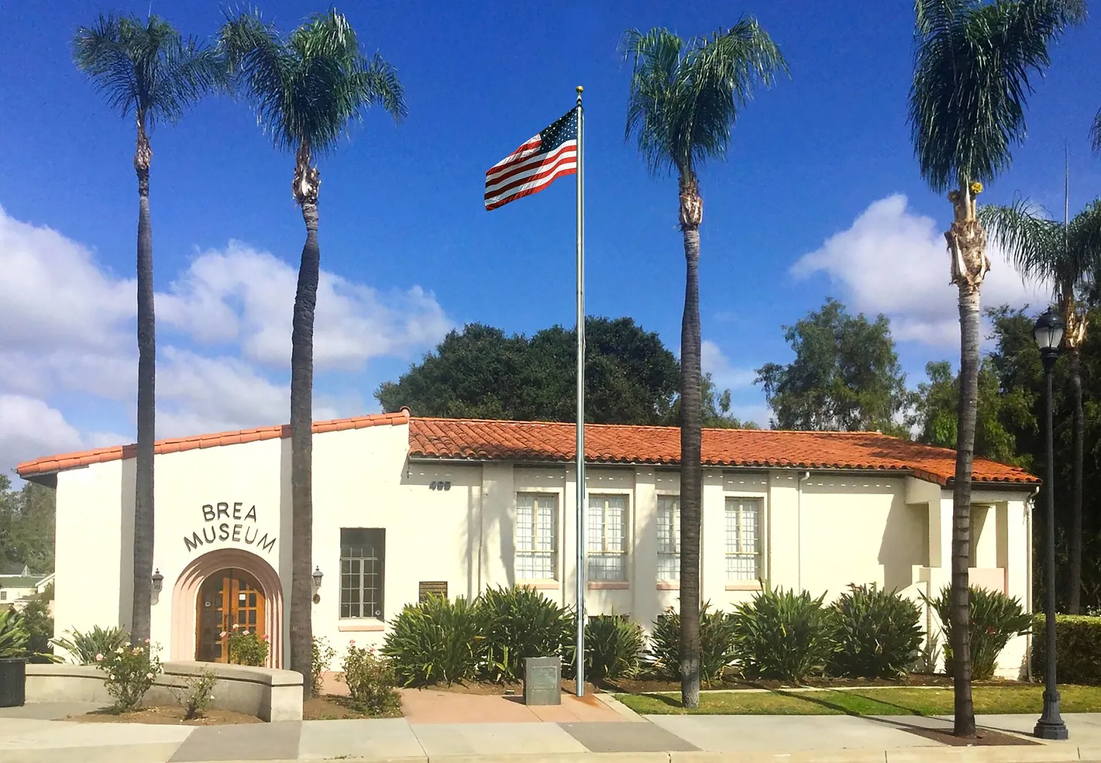 Museum Building with flagpole short2, Brea, California, United States