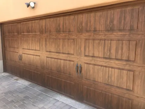 Wood-look carriage style garage door replacement in Phoenix, AZ