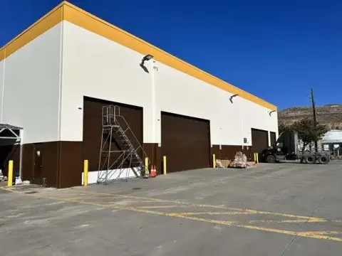 Commercial exterior painting on a warehouse building in Tucson, AZ
