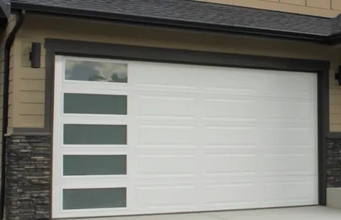 White modern garage door with frosted window panels in Greater Phoenix