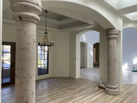 Interior repaint with arched columns and fresh walls in Tucson, AZ