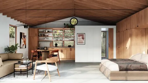 ADU interior design with vaulted wood ceilings and a built-in kitchen