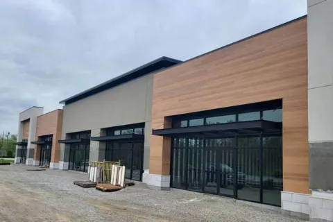 Commercial exterior painting for a Tucson, AZ retail building