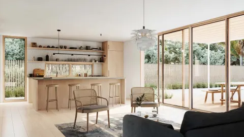 Open-concept ADU living and kitchen design with floor-to-ceiling sliding doors