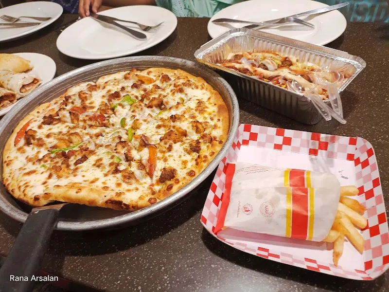Al Maida Pizza Garden, Raw Food Restaurant in Dera Ghazi Khan