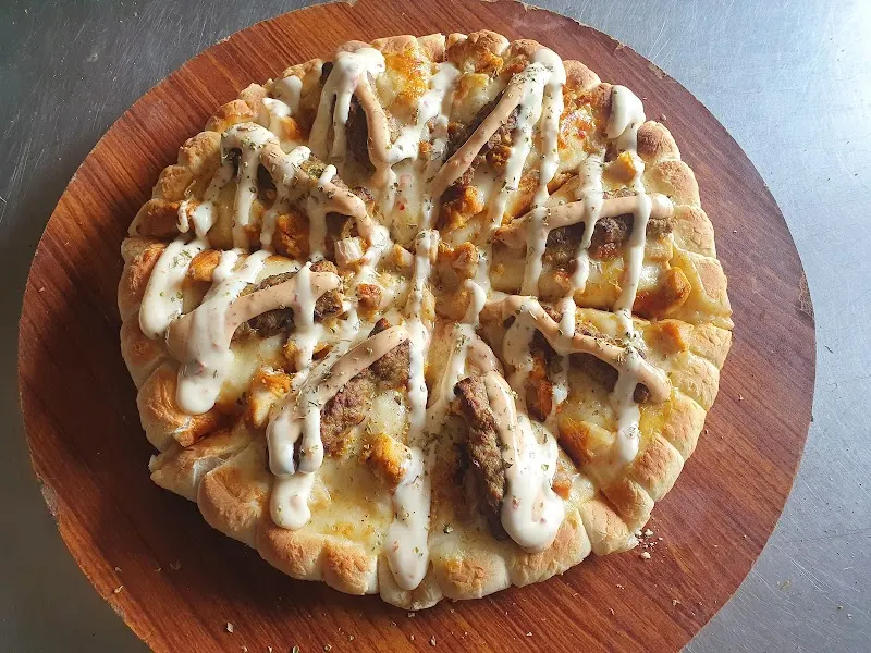 Craves Inn - Pizza Station, Carvery in Faisalabad