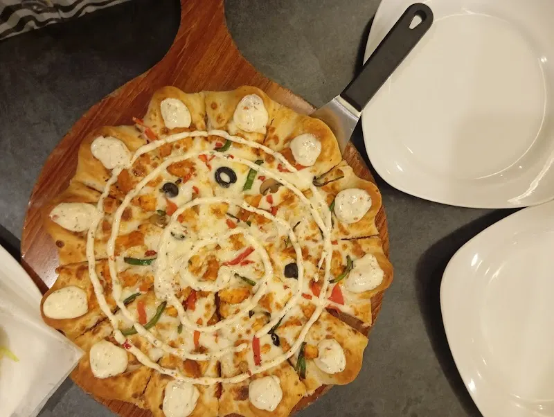 Love Bites - Grill & Pizza, Chophouse Restaurant in Chiniot